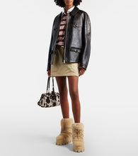 Prada Shearling and leather snow boots