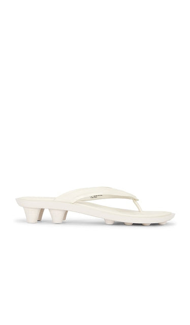 Puma Select x Fenty Cat Cleat L Sandal in White | Alpine Snow & Puma Gold Flip Flop Sandals for Women