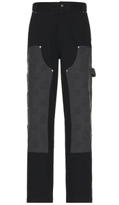 REPRESENT Embossed Utility Pants in Black - REPRÉSENT Pantalon utilitaire gaufré en noir - REPRESENT 黑色压花工装裤 - REPRESENT geprägte Utility-Hose in Schwarz - REPRESENT 엠보싱 유틸리티 팬츠블랙 색상 - Pantaloni utility REPRESENT in rilievo in nero