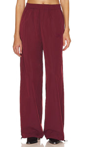 ROTATE SUNDAY Straight Leg Parachute Pants in Burgundy