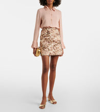 Roger Vivier Embellished metallic leather mules