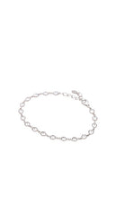 SHASHI Bezel Diamond Tennis Bracelet in Metallic Silver