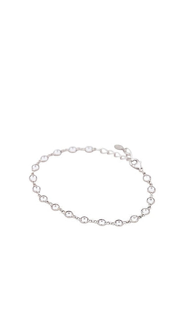 SHASHI Bezel Diamond Tennis Bracelet in Metallic Silver