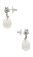 SHASHI Pave Bow Pearl Drop Earring in Metallic Silver