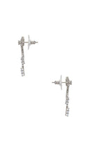 SHASHI Petite Bow Earrings in Metallic Silver