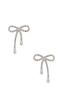 SHASHI Petite Bow Earrings in Metallic Silver