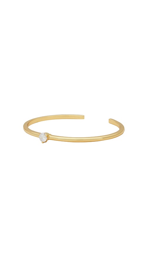 SHASHI Solitaire Bracelet Cuff in Metallic Gold