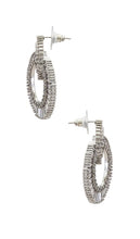 SHASHI Statement Earrings in Metallic Silver