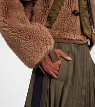 Sacai Twill-trimmed faux fur jacket