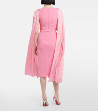 Safiyaa Essiah  and satin midi dress