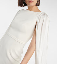 Safiyaa Essiah  and satin midi dress