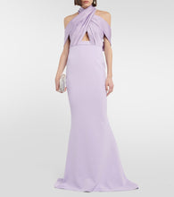 Safiyaa Louella  and satin halterneck gown