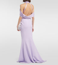 Safiyaa Louella  and satin halterneck gown