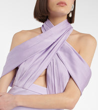 Safiyaa Louella  and satin halterneck gown