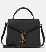 Saint Laurent Cassandra Mini leather shoulder bag. Shop Saint Laurent Shoulder Bags for women now.