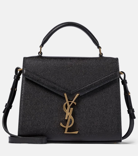 Saint Laurent Cassandra Mini leather shoulder bag. Shop Saint Laurent Shoulder Bags for women now.