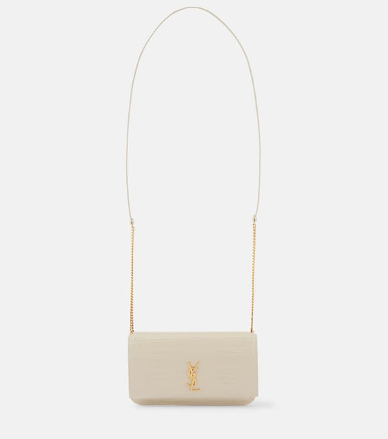 Saint Laurent Cassandre leather phone pouch. Shop Saint Laurent Shoulder Bags for women now.