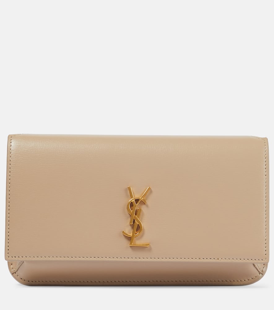 Saint Laurent Cassandre leather phone pouch. Shop Saint Laurent Shoulder Bags for women now.