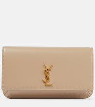 Saint Laurent Cassandre leather phone pouch. Shop Saint Laurent Shoulder Bags for women now.