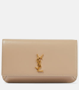 Saint Laurent Cassandre leather phone pouch. Shop Saint Laurent Shoulder Bags for women now.