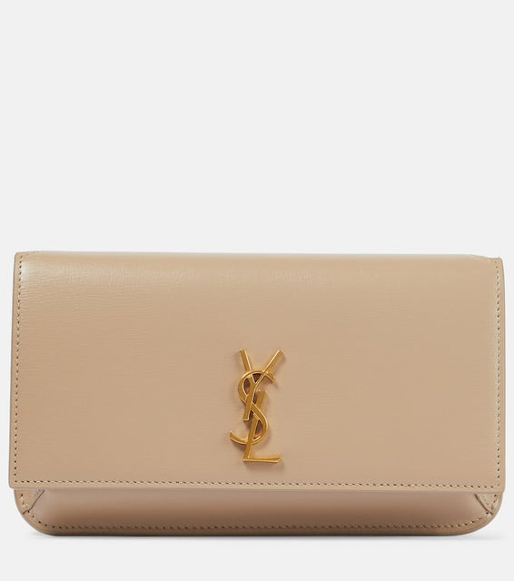 Saint Laurent Cassandre leather phone pouch. Shop Saint Laurent Shoulder Bags for women now.