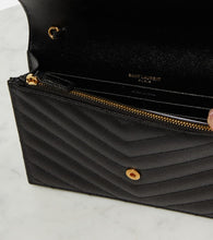 Saint Laurent Cassandre matelass√É¬© envelope leather wallet on chain