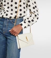 Saint Laurent Cassandre matelass√É¬© envelope leather wallet on chain