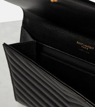 Saint Laurent Cassandre matelass√É¬© leather clutch