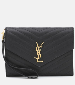 Saint Laurent Cassandre matelass√É¬© leather clutch. Shop Saint Laurent Clutches for women now.