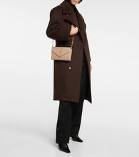 Saint Laurent Cassandre matelass√É¬© leather wallet on chain