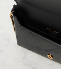 Saint Laurent Cassandre patent leather phone pouch