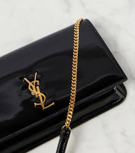 Saint Laurent Cassandre patent leather phone pouch