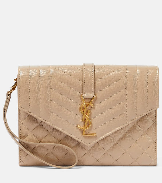 Saint Laurent Envelope matelass√É¬© leather clutch. Shop Saint Laurent Clutches for women now.