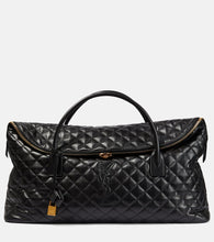 Saint Laurent Es Giant quilted leather travel bag. Shop Saint Laurent Tote Bags for women now.