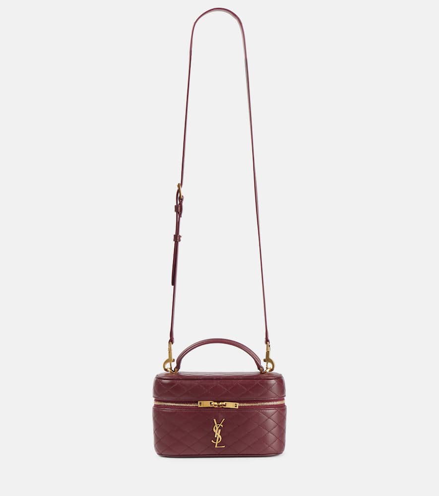 Saint Laurent Gaby patent leather vanity bag. Shop Saint Laurent Top-Handle Bags for women now.