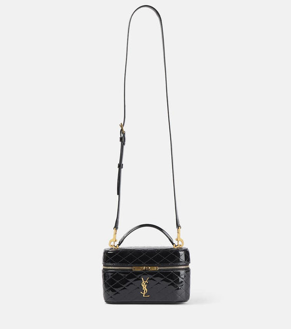 Saint Laurent Gaby quilted patent leather vanity bag. Shop Saint Laurent Top-Handle Bags for women now.
