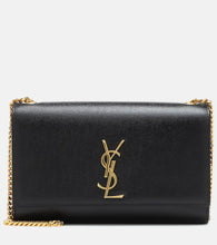 Saint Laurent Kate Medium leather shoulder bag. Shop Saint Laurent Crossbody Bags for women now.