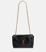 Saint Laurent Kate Medium reversible leather shoulder bag. Shop Saint Laurent Shoulder Bags for women now.