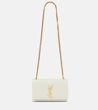 Saint Laurent Kate Small leather shoulder bag. Shop Saint Laurent Shoulder Bags for women now.