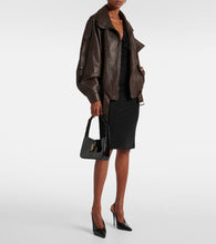 Saint Laurent Le 5 √É¬† 7 patent leather shoulder bag