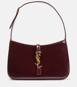 Saint Laurent Le 5 √É¬† 7 patent leather shoulder bag. Shop Saint Laurent Shoulder Bags for women now.