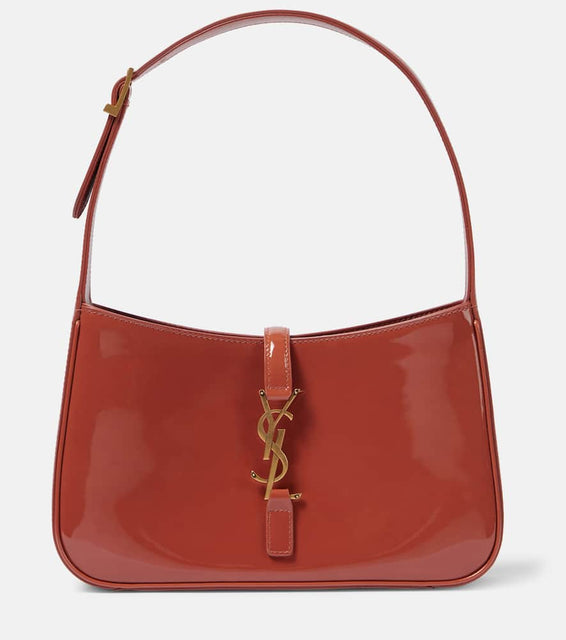 Saint Laurent Le 5 √É¬† 7 patent leather shoulder bag. Shop Saint Laurent Shoulder Bags for women now.