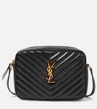 Saint Laurent Lou Camera leather crossbody bag. Shop Saint Laurent Shoulder Bags for women now.