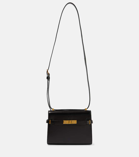 Saint Laurent Manhattan Mini leather shoulder bag. Shop Saint Laurent Shoulder Bags for women now.