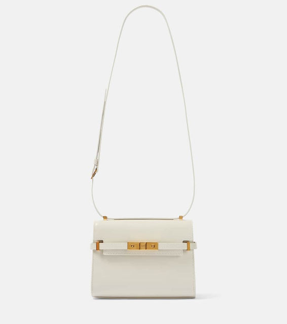 Saint Laurent Manhattan Mini leather shoulder bag. Shop Saint Laurent Shoulder Bags for women now.