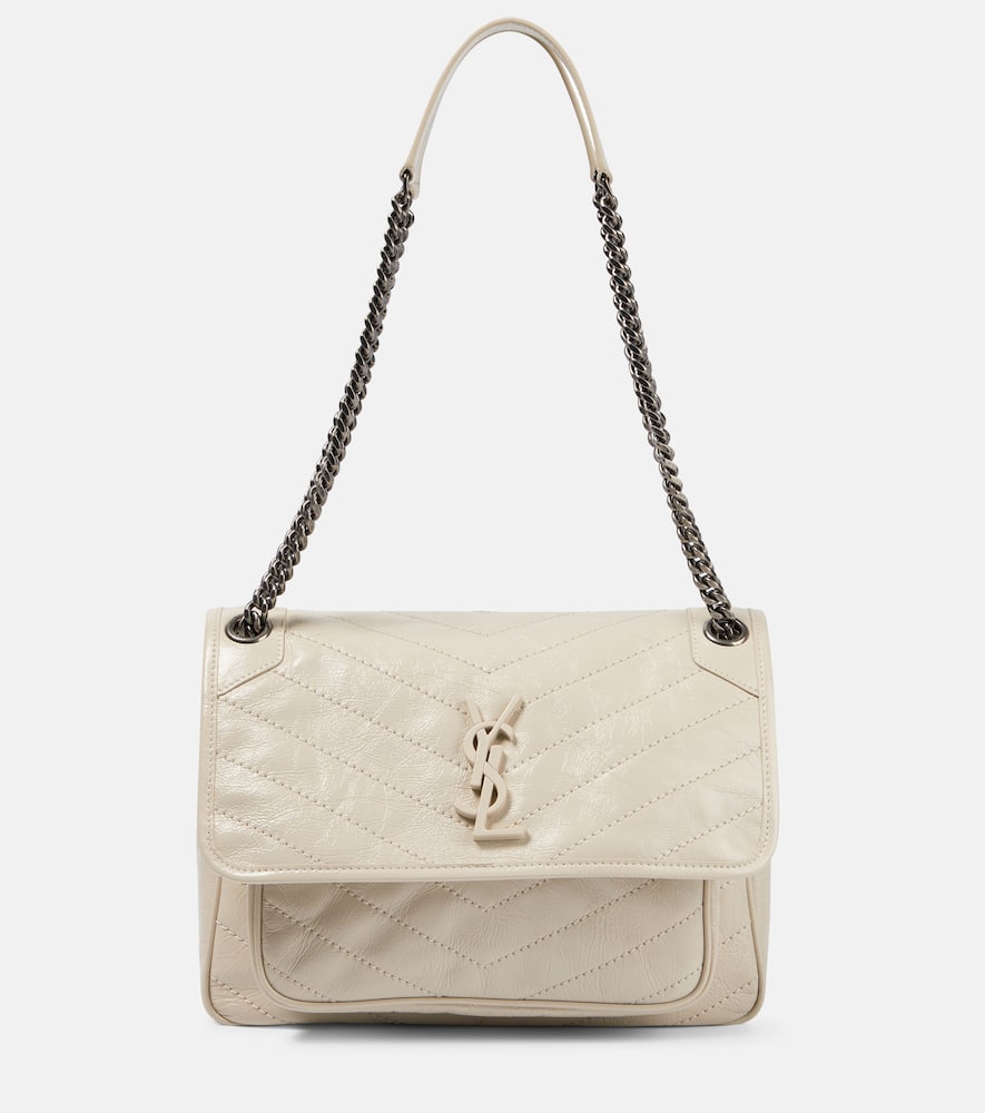 Saint Laurent Niki Medium leather shoulder bag. Shop Saint Laurent Shoulder Bags for women now.