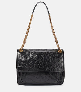 Saint Laurent Niki Medium leather shoulder bag. Shop Saint Laurent Shoulder Bags for women now.