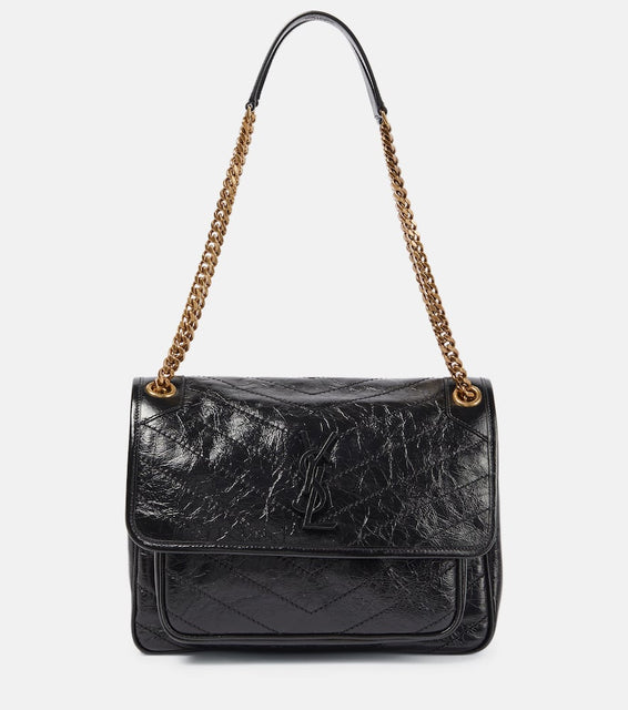 Saint Laurent Niki Medium leather shoulder bag. Shop Saint Laurent Shoulder Bags for women now.