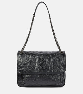 Saint Laurent Niki Medium leather shoulder bag. Shop Saint Laurent Shoulder Bags for women now.