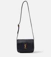 Saint Laurent Niki leather messenger bag. Shop Saint Laurent Shoulder Bags for women now.
